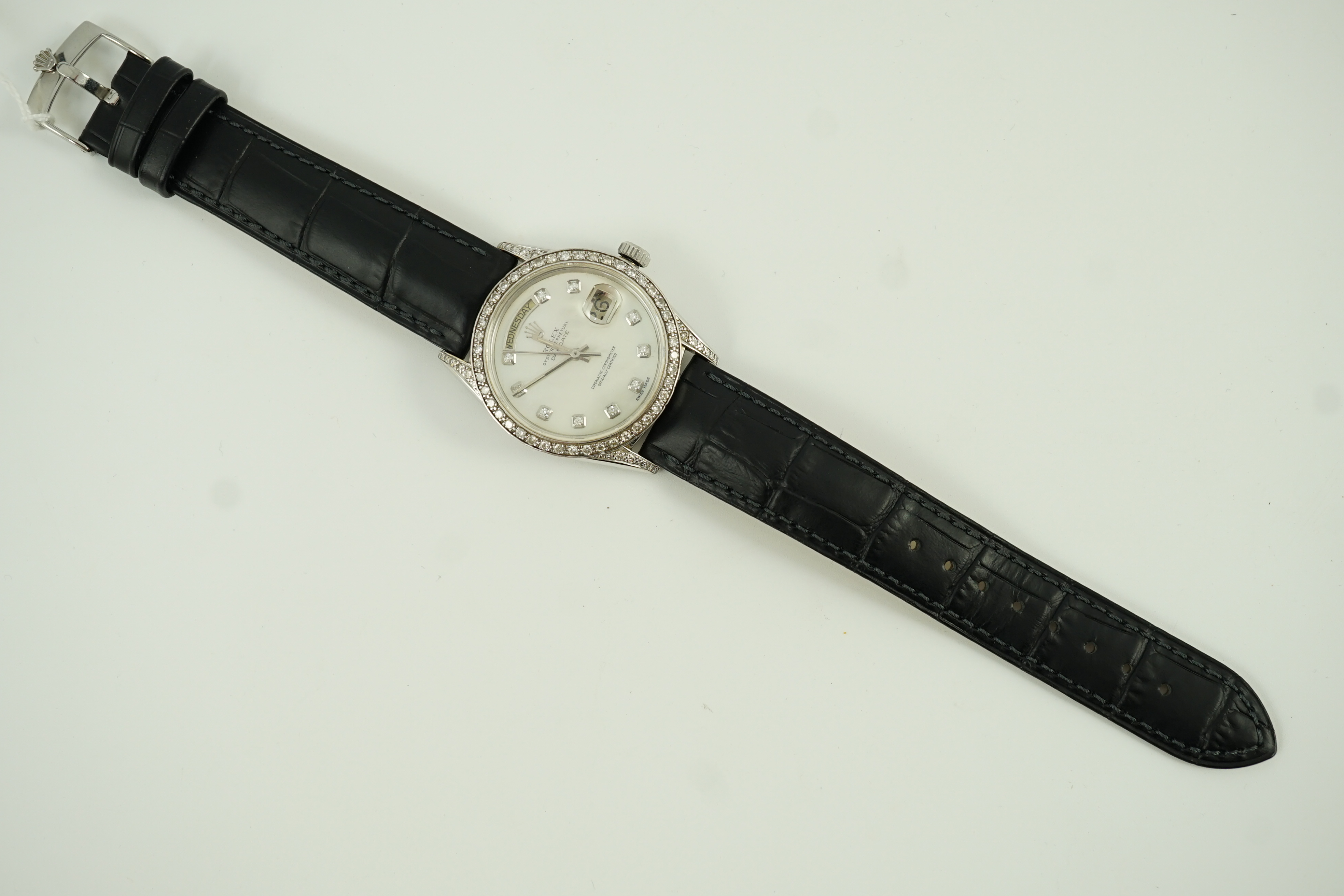 A gentleman's 1980's 18k white gold Rolex Oyster Perpetual Day Date wrist watch, with after market mother of pearl and diamond dial and diamond set bezel and lugs